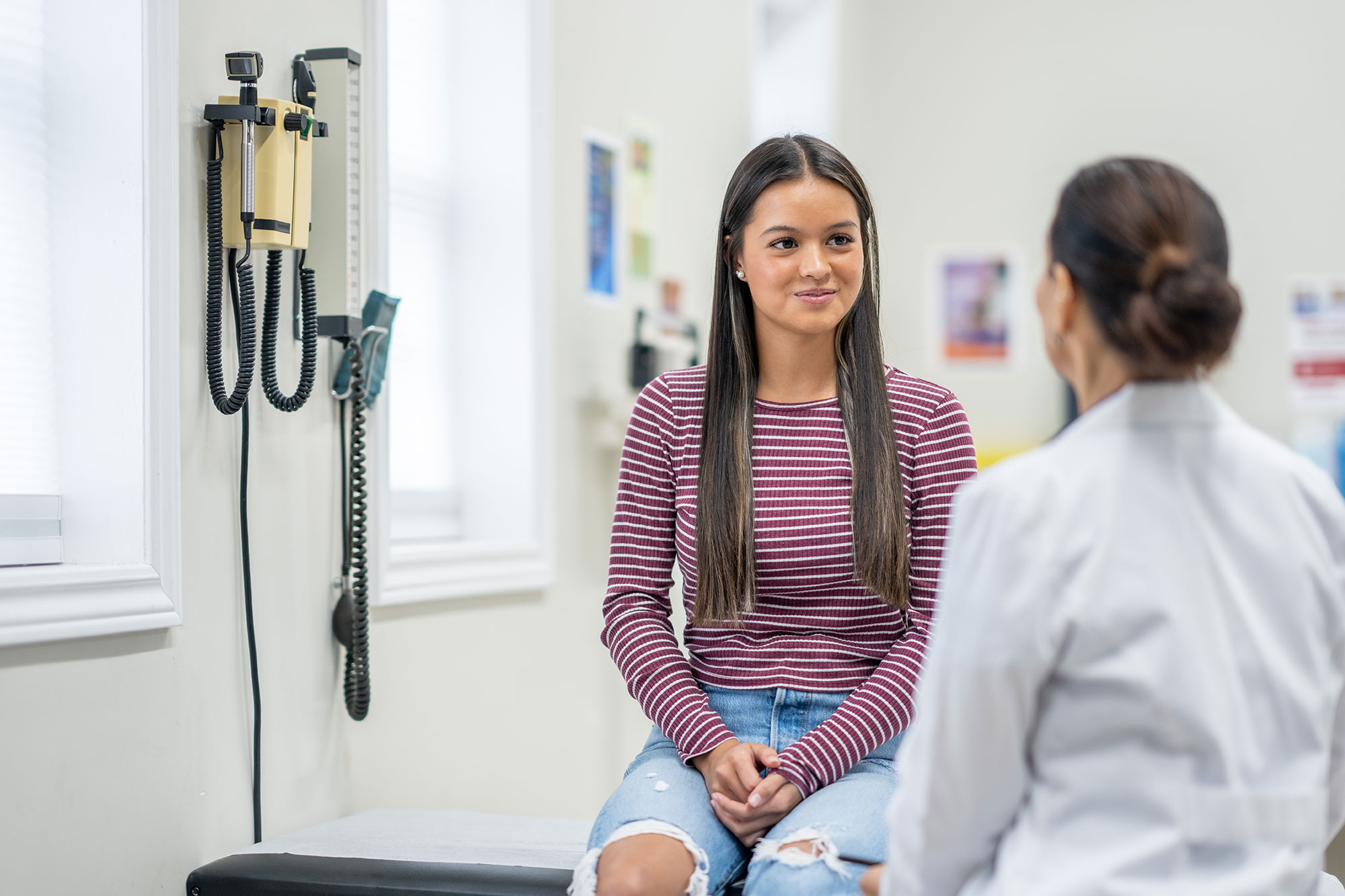 Woman Talking with a Helathfirst Expert